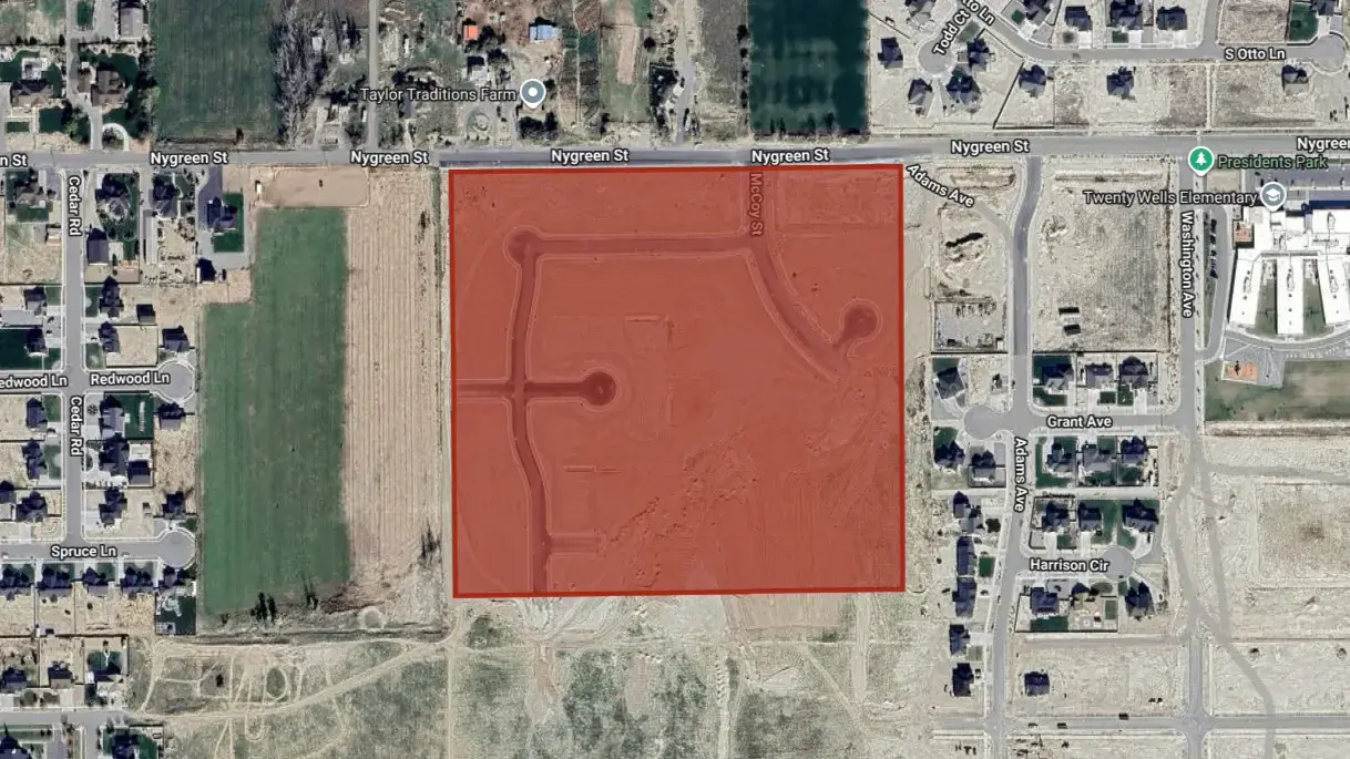 Photo from Google Earth showing Heritage Farms from above. A red shape outlines the exact area the subdivision occupies.